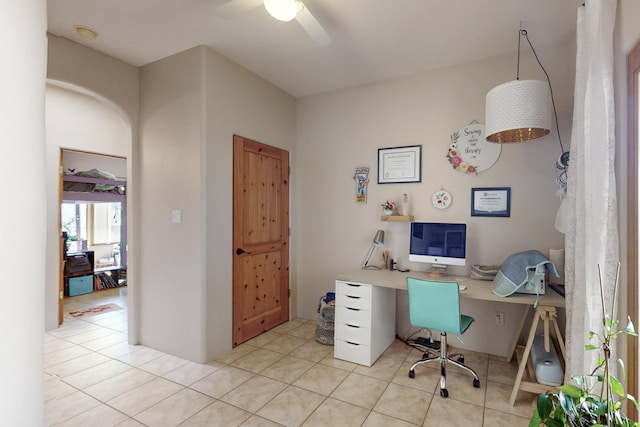 office space with tile patterned floors and ceiling fan