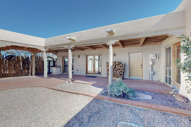 view of patio featuring french doors