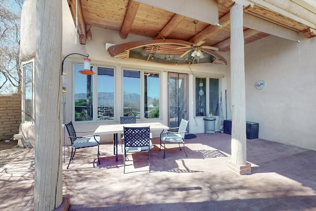 view of patio featuring a ceiling fan