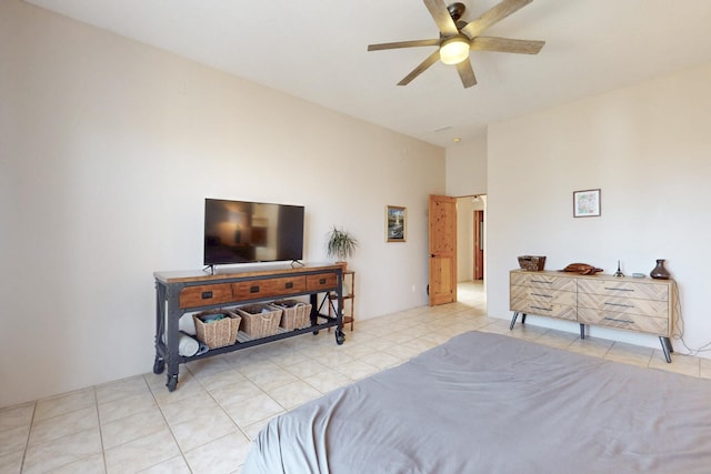 bedroom featuring tile patterned floors and ceiling fan