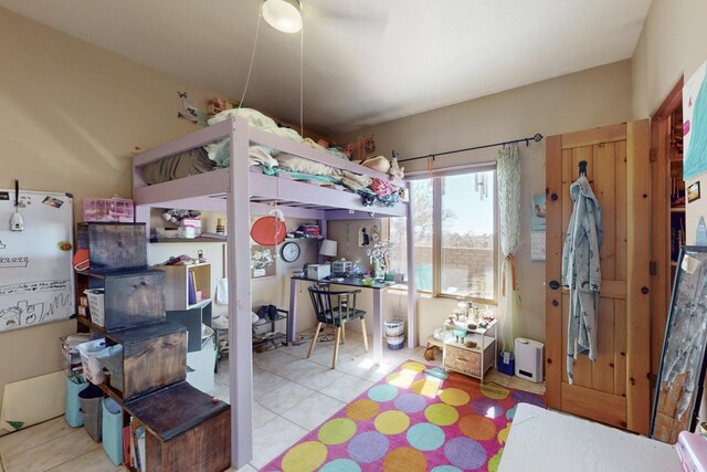 bedroom with tile patterned flooring