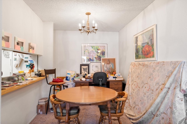 dining room featuring a textured ceiling, carpet, and an inviting chandelier