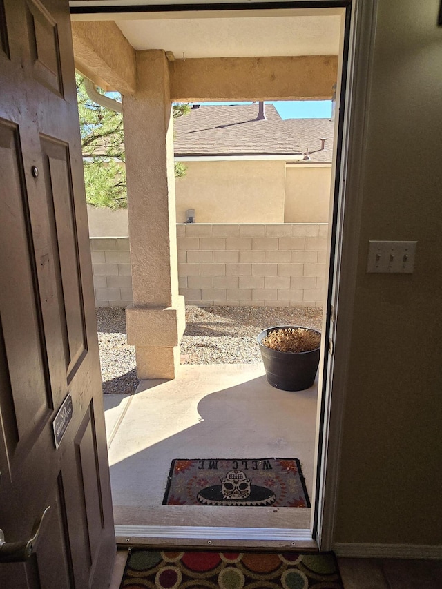 view of patio / terrace featuring fence