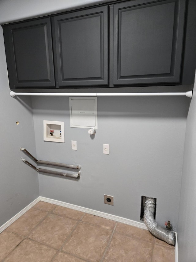 laundry room featuring cabinet space, baseboards, gas dryer hookup, hookup for an electric dryer, and washer hookup