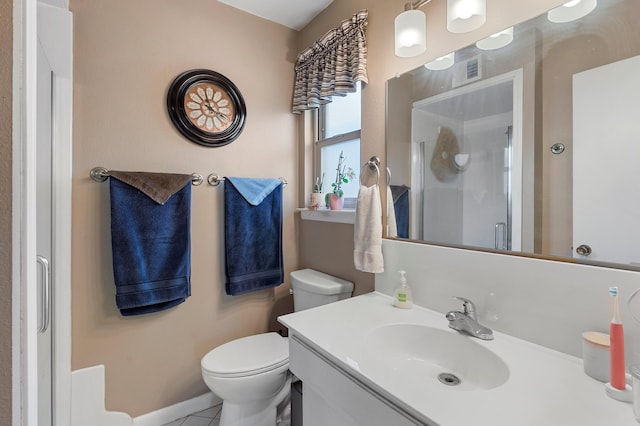 full bath featuring toilet, a shower stall, visible vents, and vanity