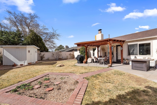 back of property featuring an outbuilding, a yard, a chimney, fence, and a pergola