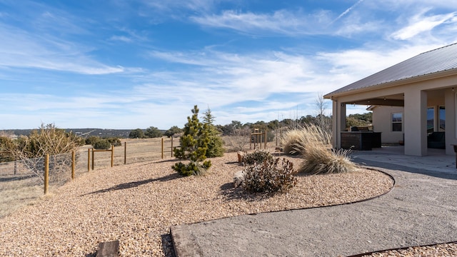 view of yard with a patio area and fence