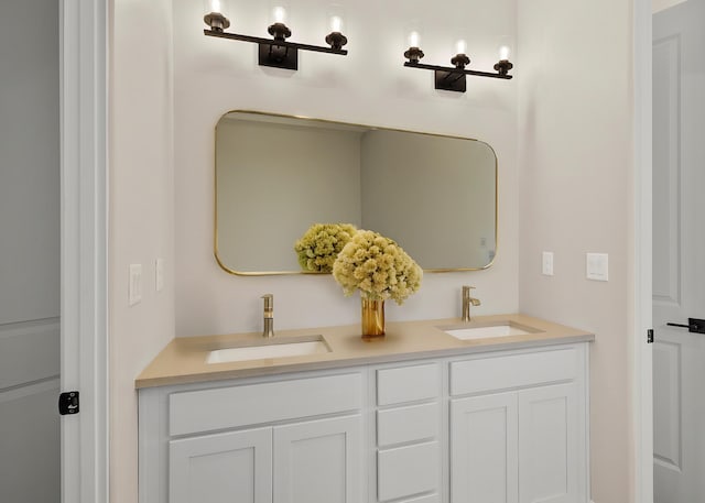 bathroom with double vanity and a sink