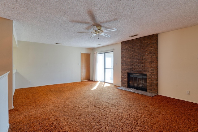 unfurnished living room with a ceiling fan, a brick fireplace, visible vents, and carpet flooring