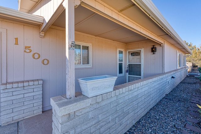 exterior space featuring brick siding