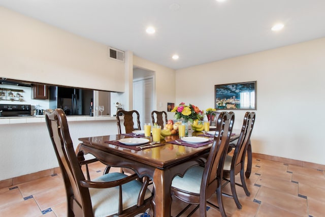 dining space featuring recessed lighting, visible vents, and light tile patterned floors