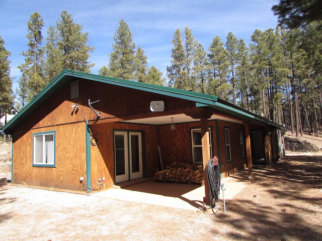 rear view of property with a patio area