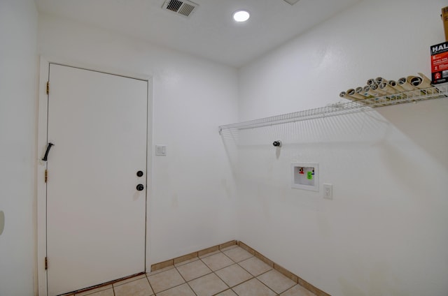 clothes washing area with laundry area, light tile patterned floors, visible vents, hookup for a washing machine, and recessed lighting