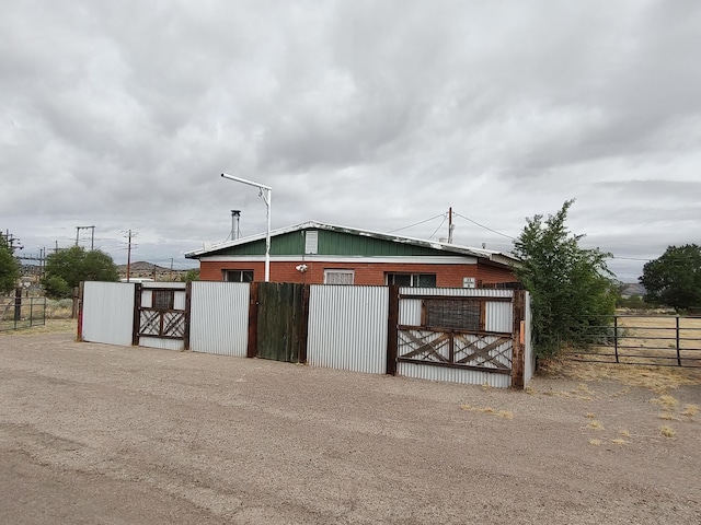 exterior space featuring an exterior structure and an outbuilding