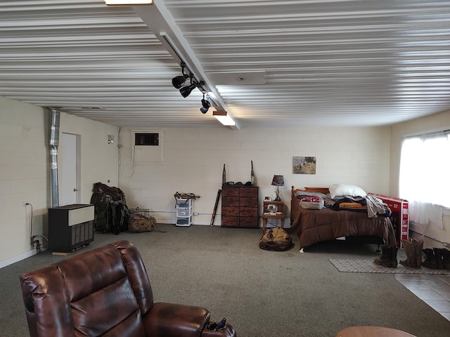 interior space featuring concrete block wall