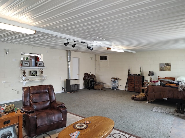 living room with concrete block wall