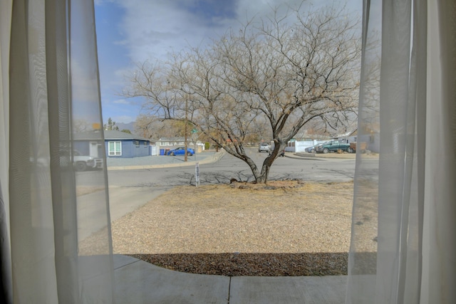 view of yard with a residential view