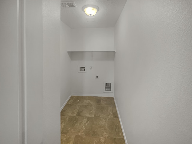 clothes washing area featuring hookup for a washing machine, visible vents, gas dryer hookup, electric dryer hookup, and laundry area