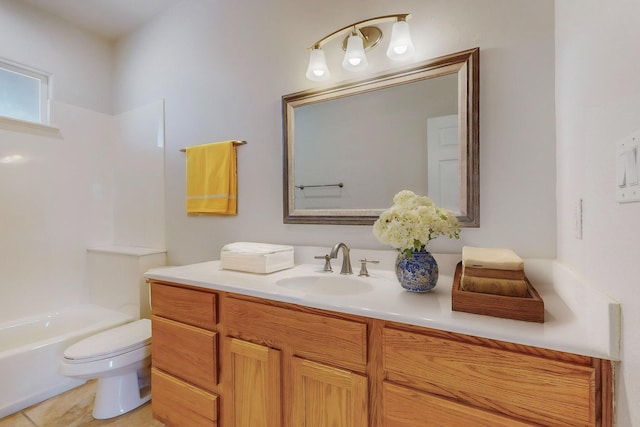 bathroom with toilet and vanity