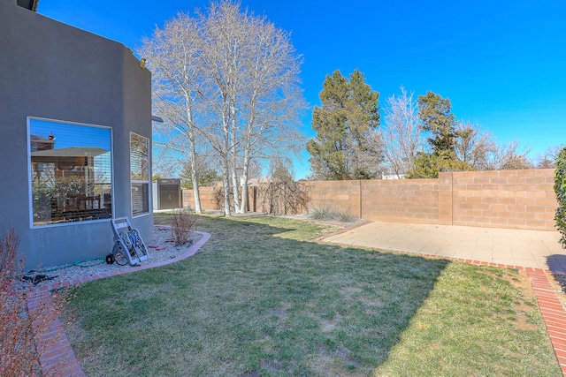 view of yard with a fenced backyard