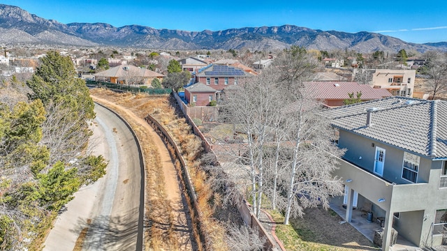 drone / aerial view with a mountain view and a residential view