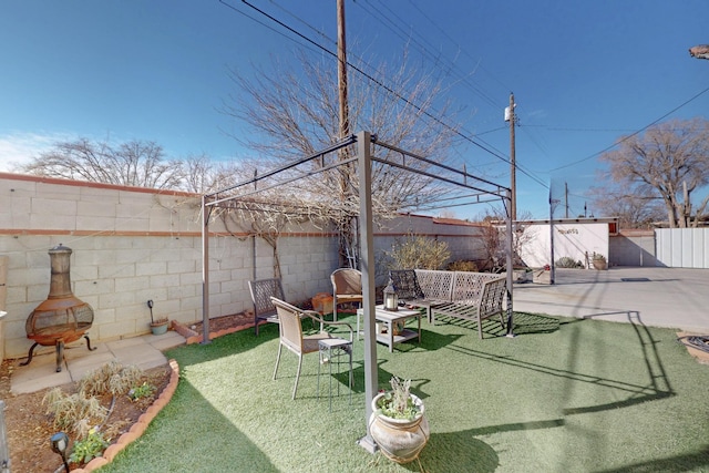 view of yard with a patio and a fenced backyard