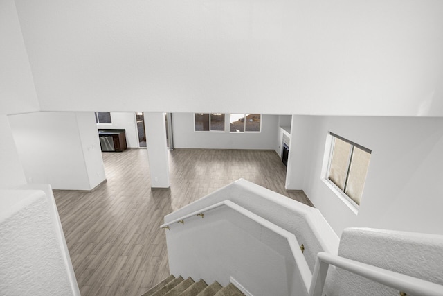 stairs with wood finished floors