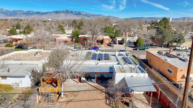 drone / aerial view with a residential view and a mountain view