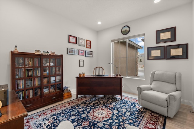 office with recessed lighting, baseboards, and wood finished floors