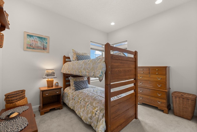 bedroom featuring recessed lighting and light colored carpet