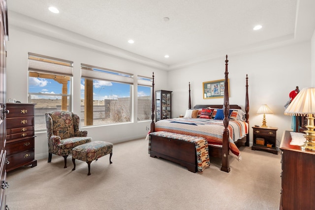 bedroom featuring recessed lighting, baseboards, and light colored carpet