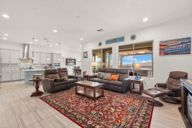 living area with recessed lighting