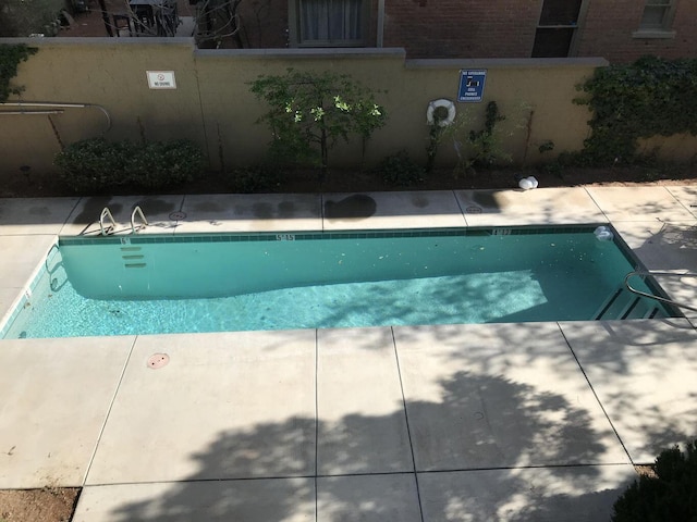 pool featuring a patio