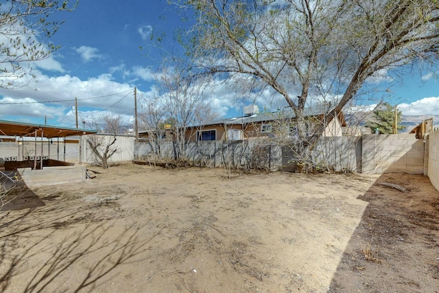 view of yard featuring a fenced backyard