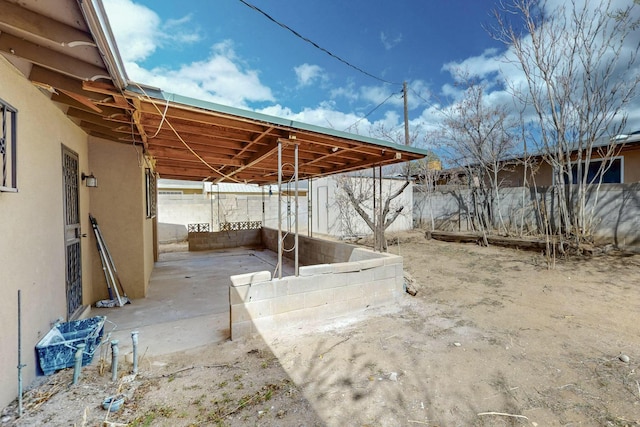 view of patio with fence