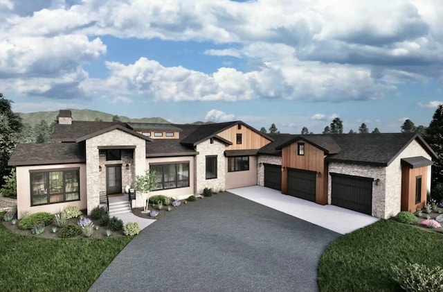 view of front of home featuring a garage, stone siding, and driveway