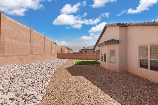 view of yard featuring a fenced backyard