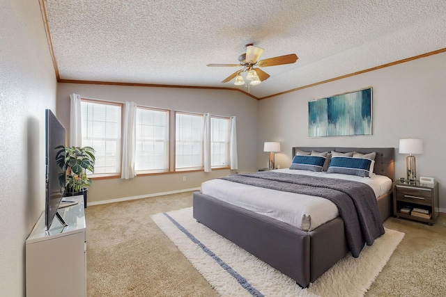 bedroom featuring lofted ceiling, ornamental molding, multiple windows, and light colored carpet