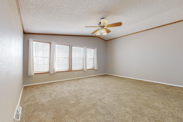 unfurnished room featuring carpet floors, visible vents, ornamental molding, vaulted ceiling, and a textured ceiling