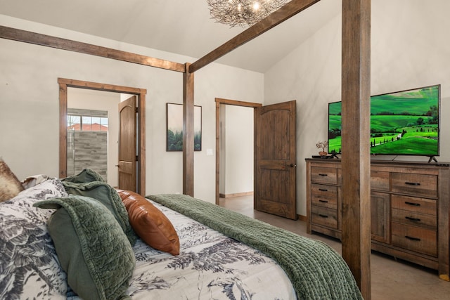 bedroom with concrete flooring and vaulted ceiling