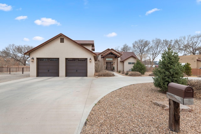 1800 Los Pinos Rd, Bosque Farms, NM 87068 - view of front facade featuring stucco siding, concrete driveway, and a garage