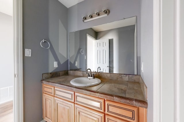 bathroom featuring visible vents and vanity