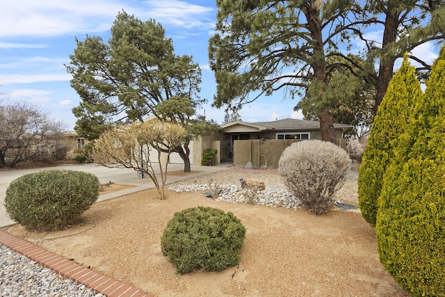 view of front facade with a garage and stucco siding