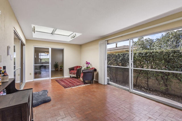 sunroom with a skylight