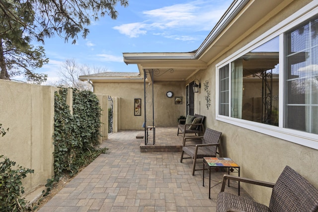 view of patio / terrace with fence