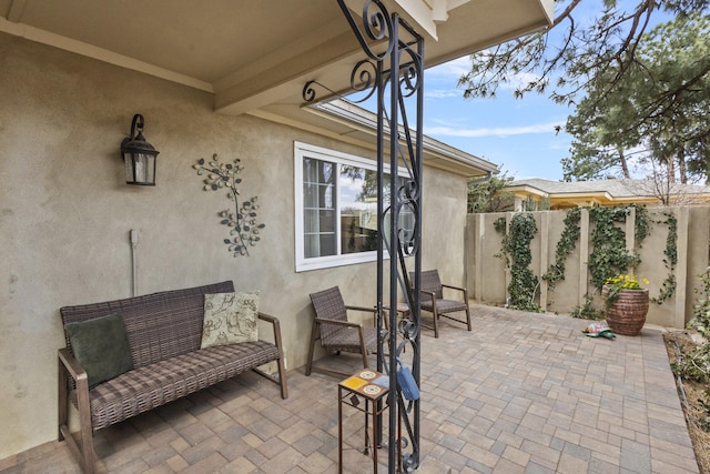 view of patio with fence