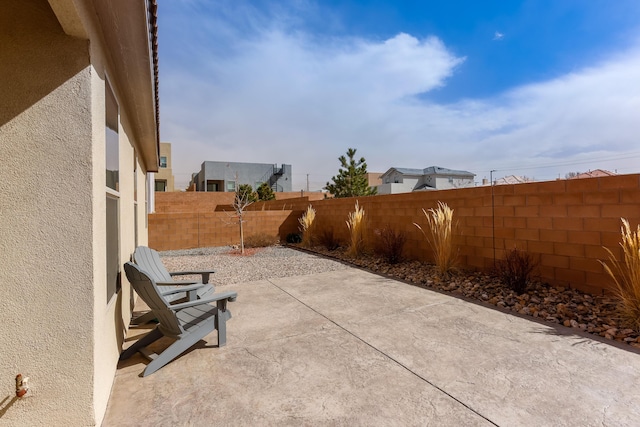 view of patio with a fenced backyard