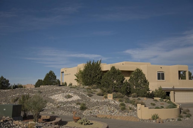 exterior space with stucco siding