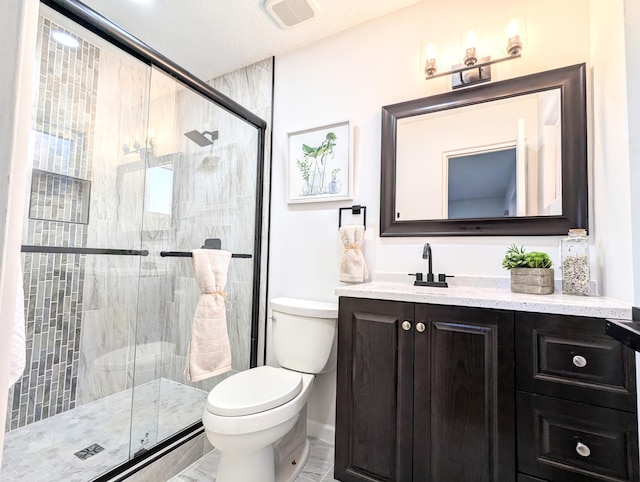 full bathroom with visible vents, toilet, a stall shower, and vanity