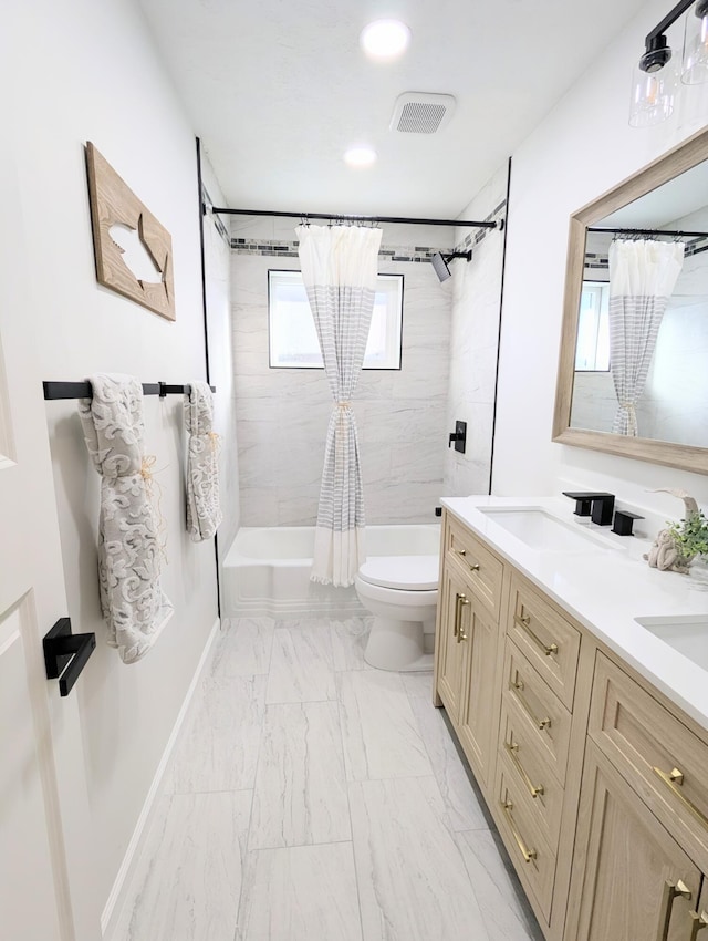 bathroom featuring visible vents, toilet, marble finish floor, shower / bath combo, and double vanity